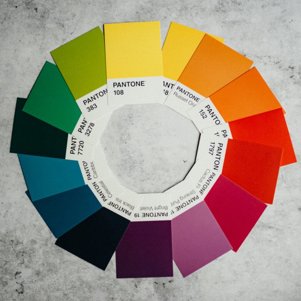 Color wheel displaying a range of hues, demonstrating the use of complementary and analogous colors for creating a balanced color palette in branding.