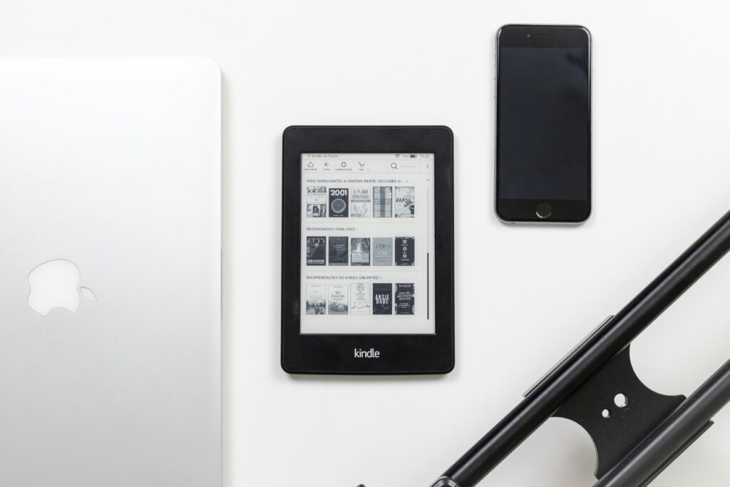 A person reading or holding an eBook on a tablet, representing in-depth knowledge and content marketing.