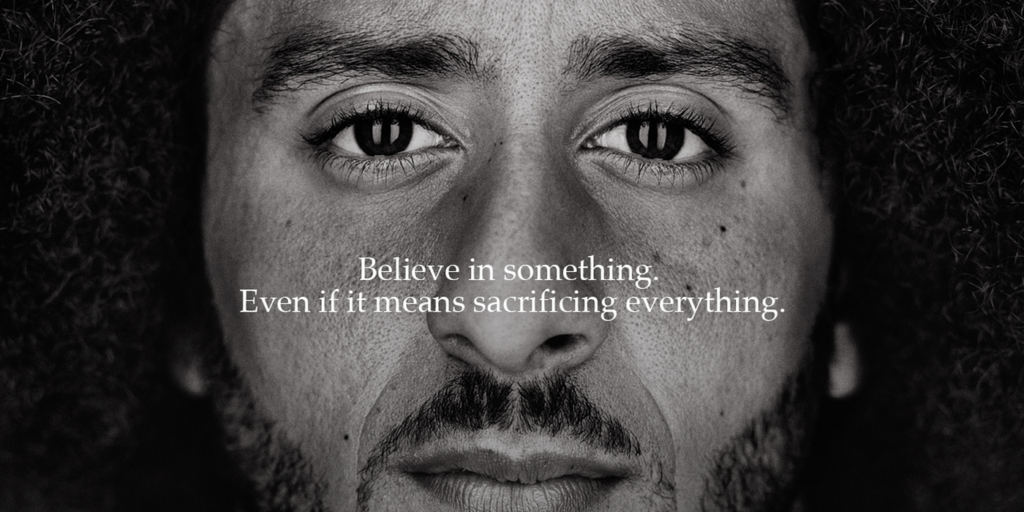 Colin Kaepernick in Nike's 'Dream Crazy' ad with the quote 'Believe in something, even if it means sacrificing everything, this is a sample of visual marketing.