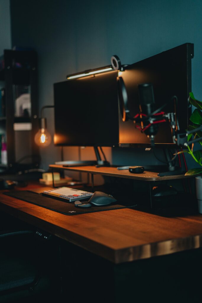 Modern computer setup on a clean white desk with minimalist decor and open workspace of Market Glimpse.