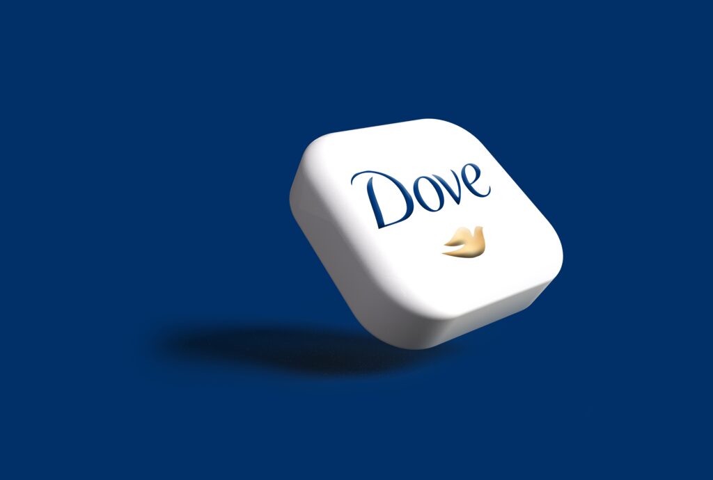 Dove logo displayed on a block, symbolizing the brand's commitment to real beauty and empowerment.