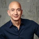 Jeff Bezos smiling with the quote 'Your brand is what other people say about you when you're not in the room.'