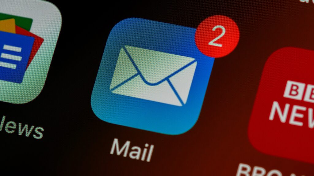 iPhone Mail app icon with a notification badge indicating new email marketing alerts.