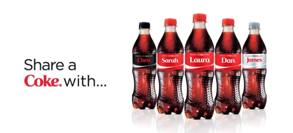 Coca-Cola bottles displaying the phrase "Share a Coke with..." alongside personalized names, showcasing the impact of storytelling marketing.